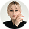Portrait of a stylish young woman with blonde hair and red manicure.